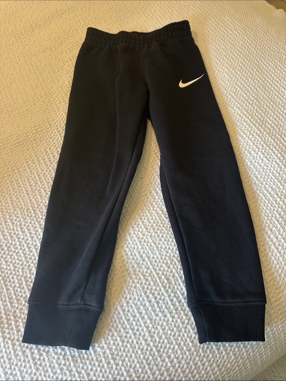 Nike Kids Black Sweatpants with White Swoosh Logo